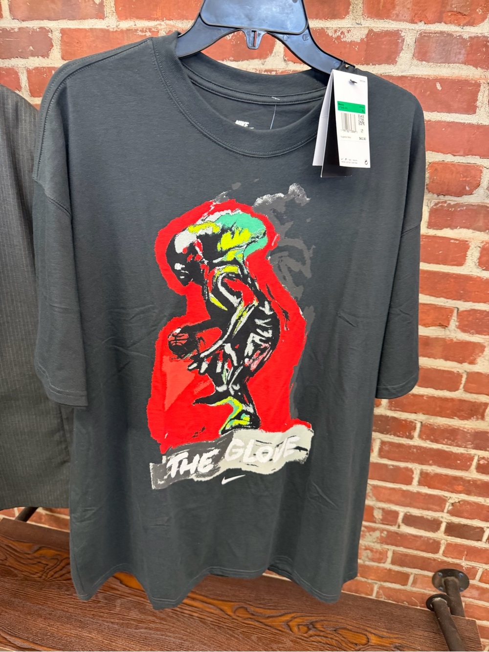 Nike Black Short-Sleeve Tee with Multicolor Basketball Graphic